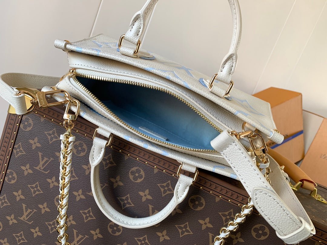 {Style No: AIIQKONK} LV 25S ONTHEGO EAST WEST BAG 25 IN WHITE BLUE CALFSKIN MONOGRAM EMPREINTE - Image 4