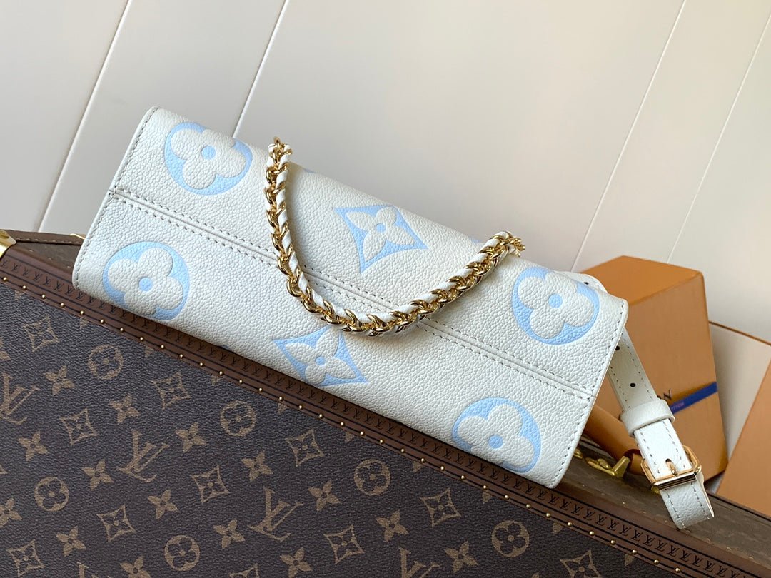 {Style No: AIIQKONK} LV 25S ONTHEGO EAST WEST BAG 25 IN WHITE BLUE CALFSKIN MONOGRAM EMPREINTE - Image 5