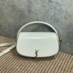 {Style No: YAH5XNVE} VOLTAIRE HALF-MOON SHOULDER BAG 24 IN WHITE CALFSKIN GOLD METALLIC