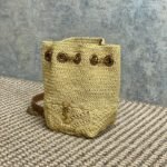 {Style No: ASPFD2AX} DRAWSTRING BUCKET BAG 19 IN BEIGE WOVEN RAFFIA AND CALFSKIN