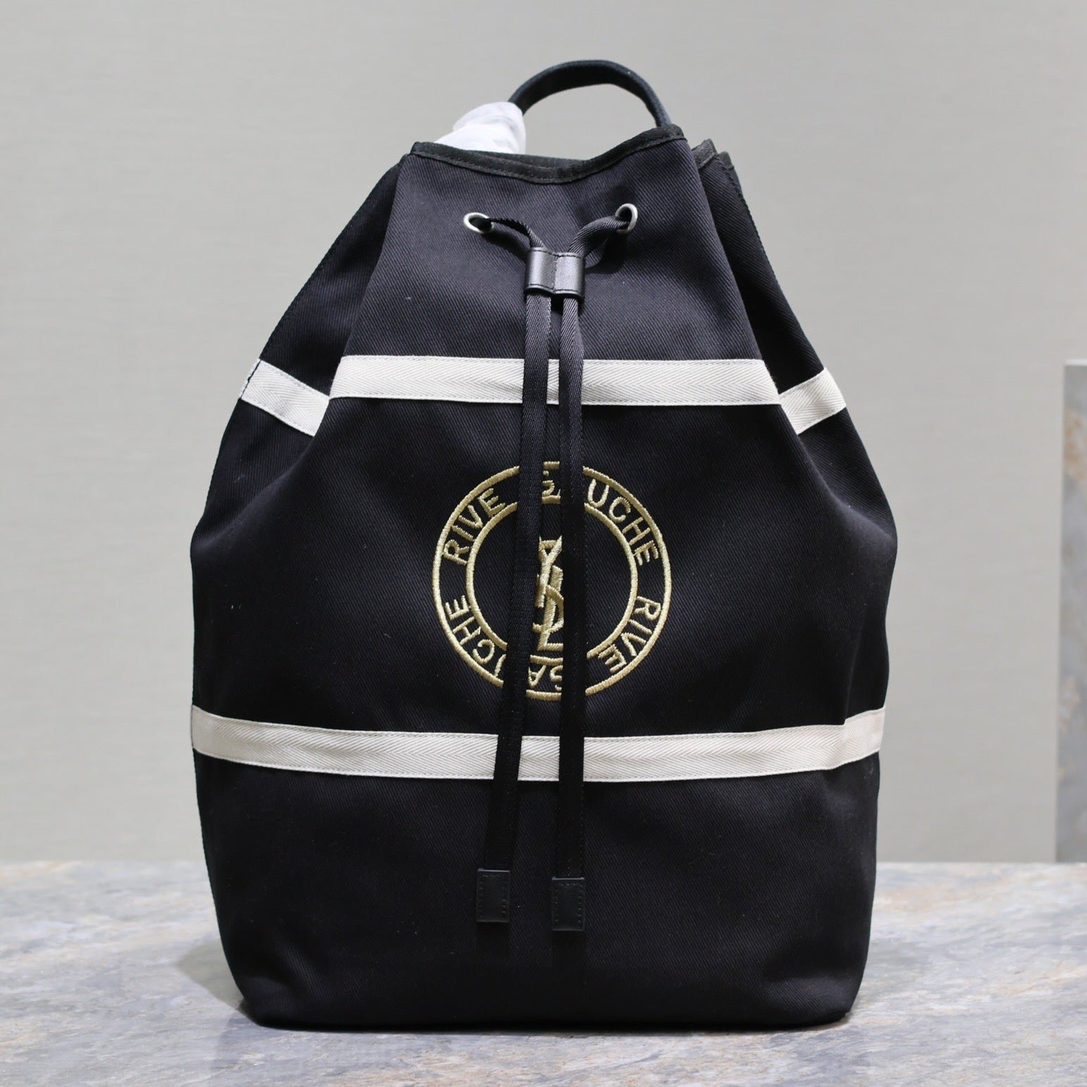 {Style No: 5MAWHZ1U} RIVE GAUCHE BACKPACK 49 IN BLACK MIX WHITE CANVAS