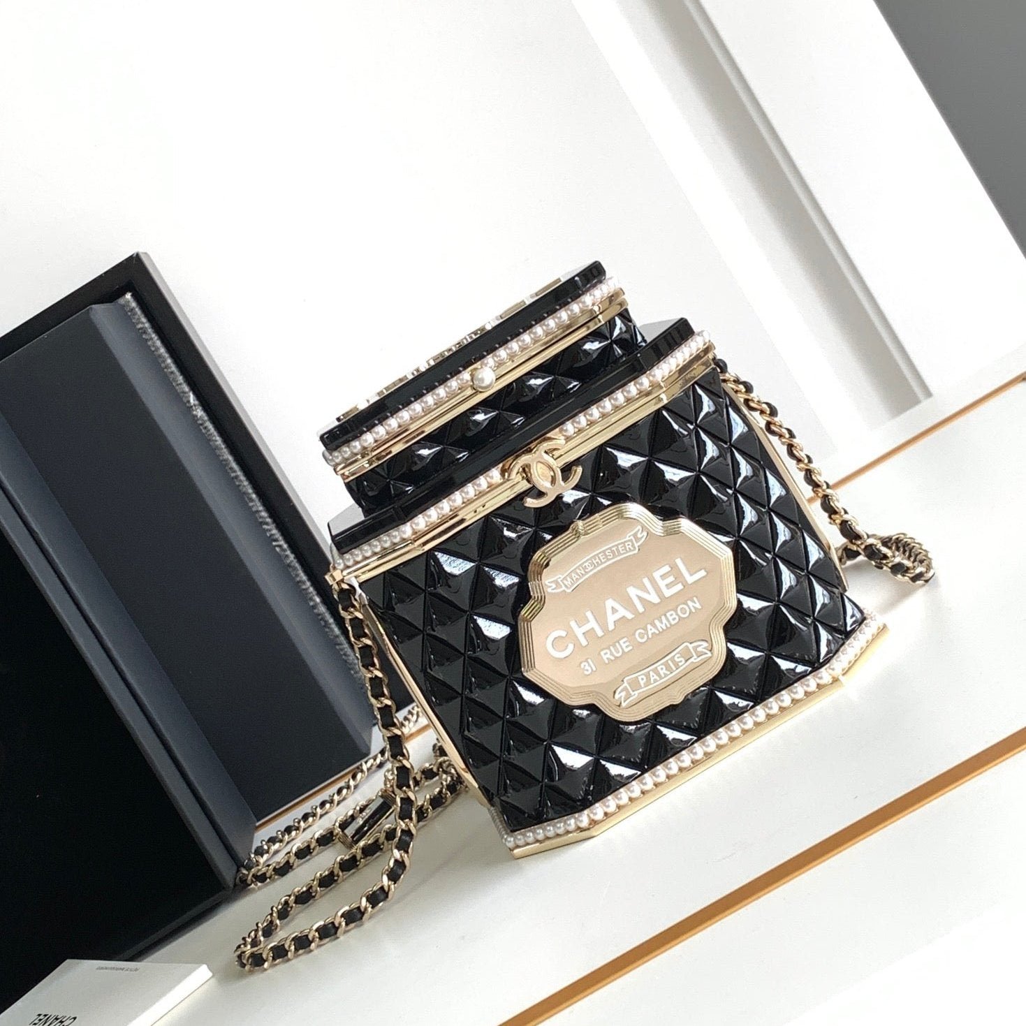 {Style No: X85SQRVT} CC 12 TEA BOX MINAUDIERE BAG IN BLACK RESIN