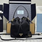 {Style No: HWPPZJS2} BUCKET BAG 19 IN BLACK RE-NYLON AND CALFSKIN HANDLE