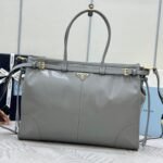 {Style No: V3SGVZBN} PRADA 25S LUX SOFT BAG 42 IN GRAY GLOSSY CALFSKIN GOLD HARDWARE