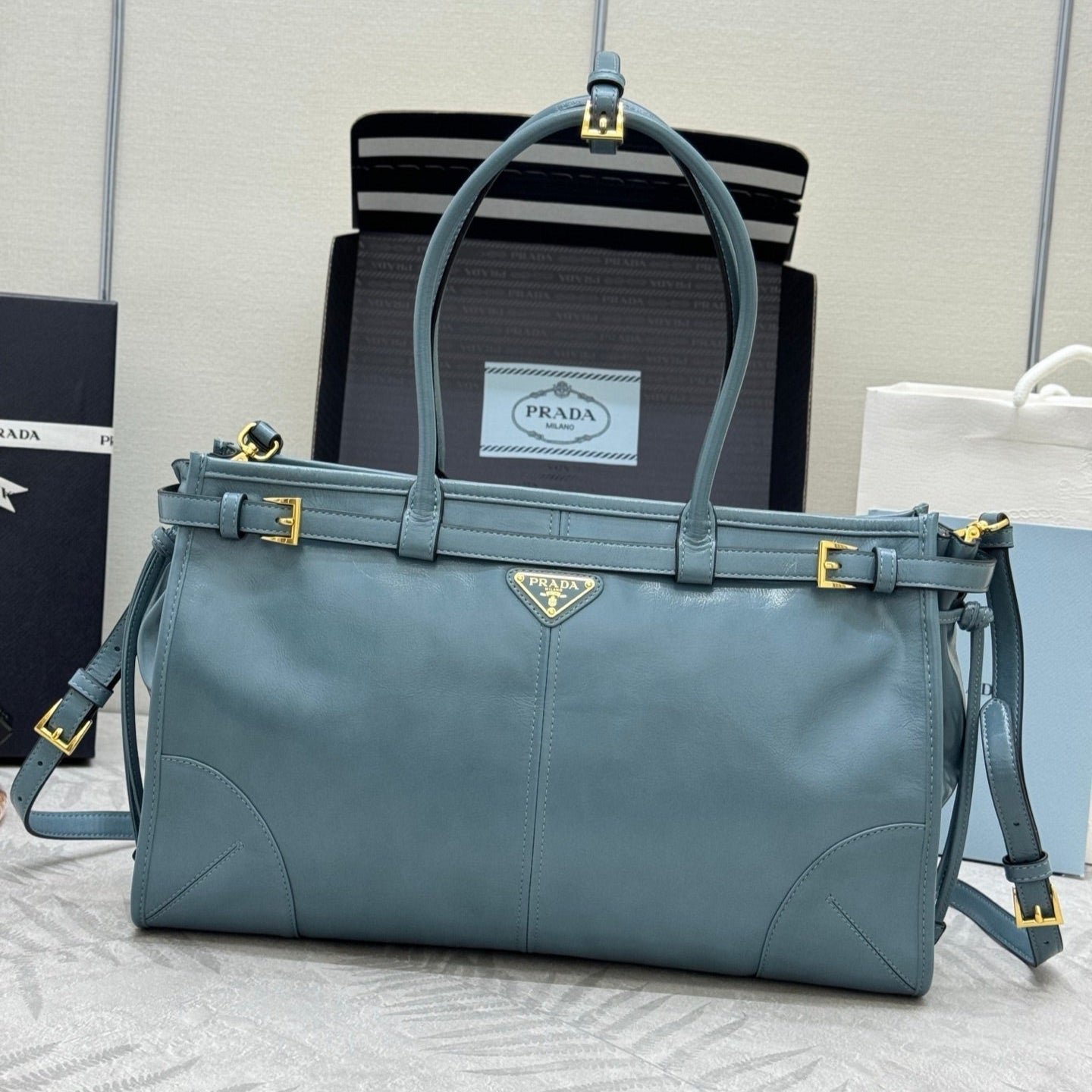 {Style No: G432J3EG} PRADA 25S BONNIE LARGE HANDBAG 38 IN LIGHT BLUE GLOSSY CALFSKIN GOLD HARDWARE
