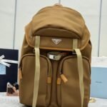 {Style No: LZPDMBSZ} PRADA 25S RE-EDITION 1978 RE-NYLON BACKPACK 52 IN BROWN SILVER HARDWARE