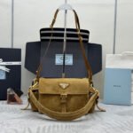 {Style No: TG2VOWVW} PRADA 25S EXPLORE MEDIUM SHOULDER BAG 30 IN DARK GOLDEN BROWN SUEDE WITH FLAP