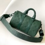 {Style No: LF4P4ISK} KEEPALL BANDOULIÈRE 25 IN FOREST GREEN MONOGRAM EMBOSSED CALFSKIN