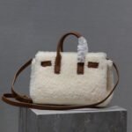 {Style No: 1WCPMS9X} SAC DE JOUR 22 IN WHITE SHEARLING AND BROWN CALFSKIN TRIM
