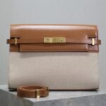 {Style No: 5GWH34L3} MANHATTAN MEDIUM 29 IN WHITE CANVAS AND BROWN CALFSKIN GOLD BUCKLE