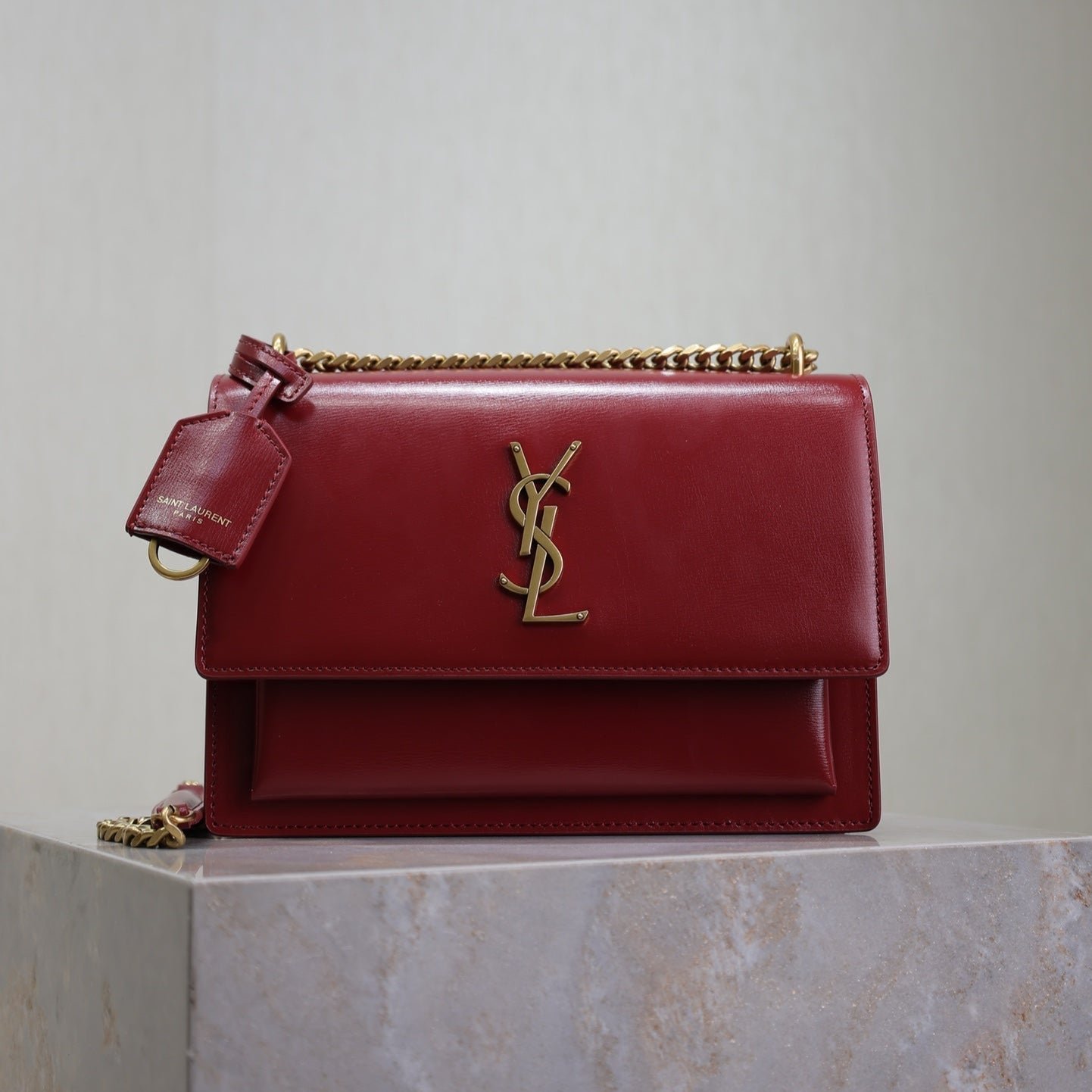{Style No: HA2UMC9G} YSL 25S SUNSET BAG 22 IN CRIMSON RED CALFSKIN GOLD HARDWARE